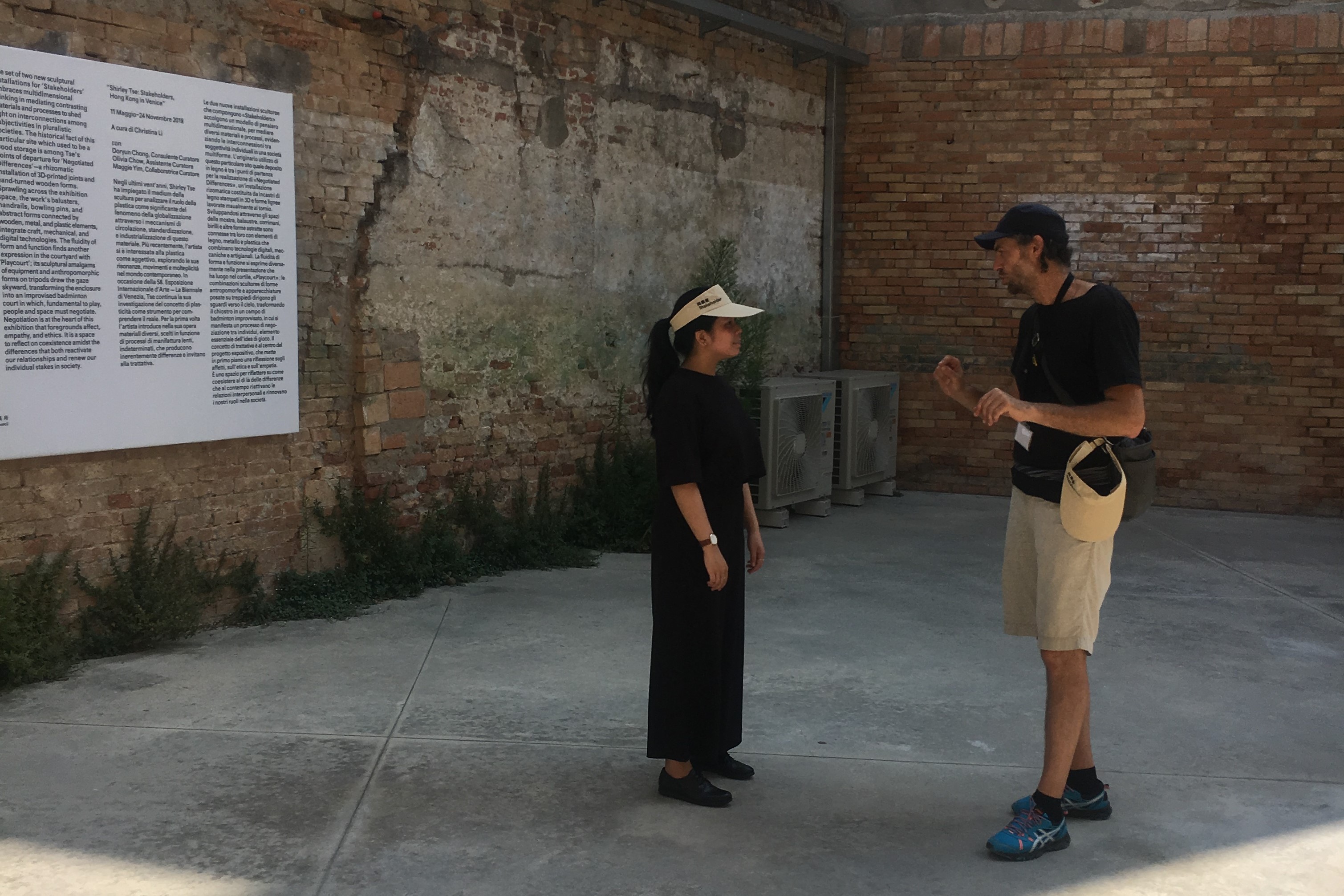 Sonia and Francesco were talking in the courtyard.